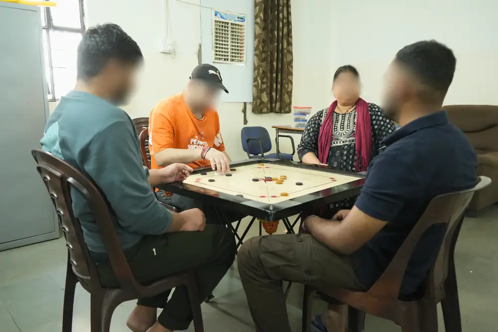 Patients playing carrom at Affinity Rehab